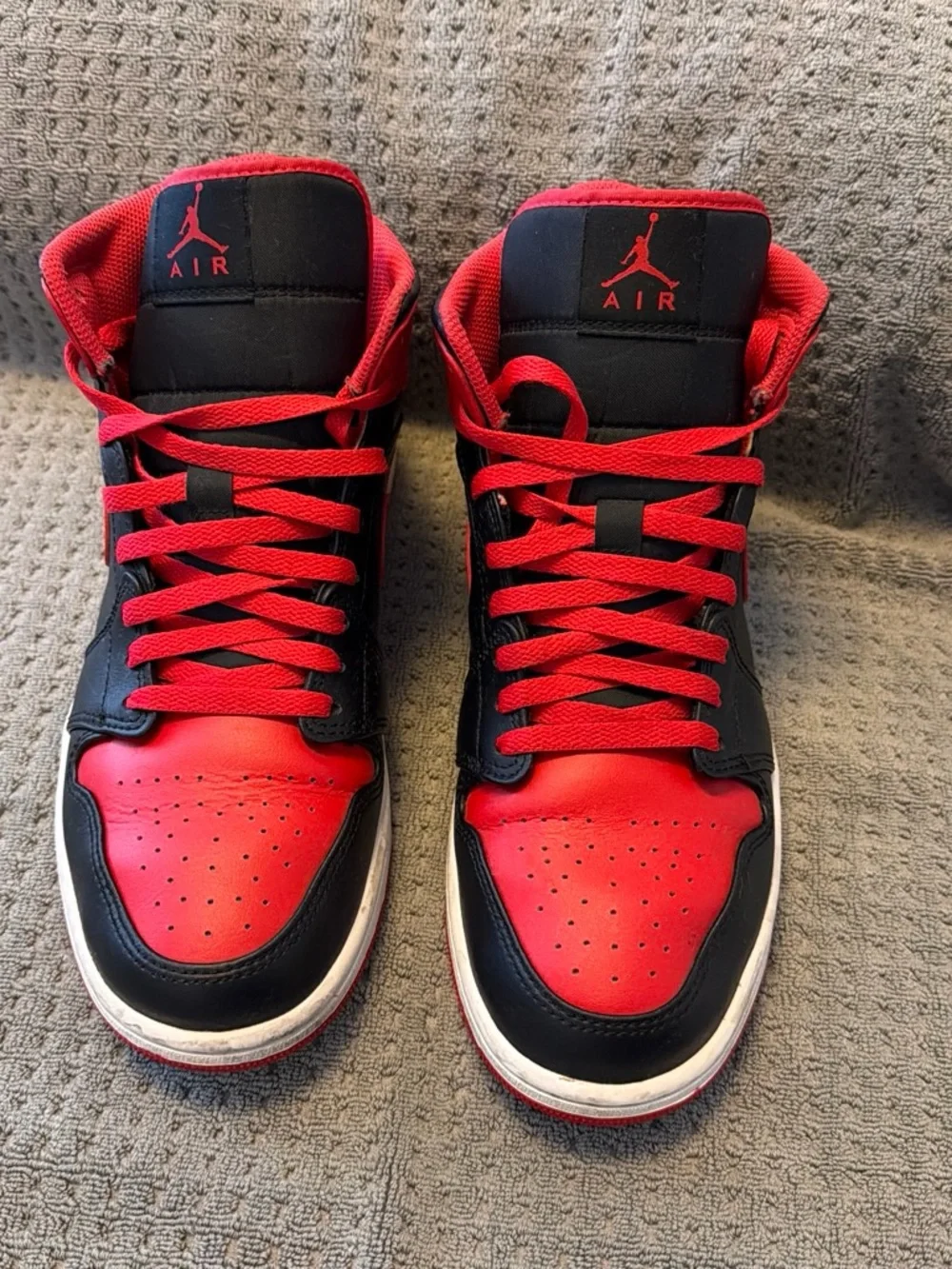 Air Jordan 1 Mid Black and Red High-Top Sneakers